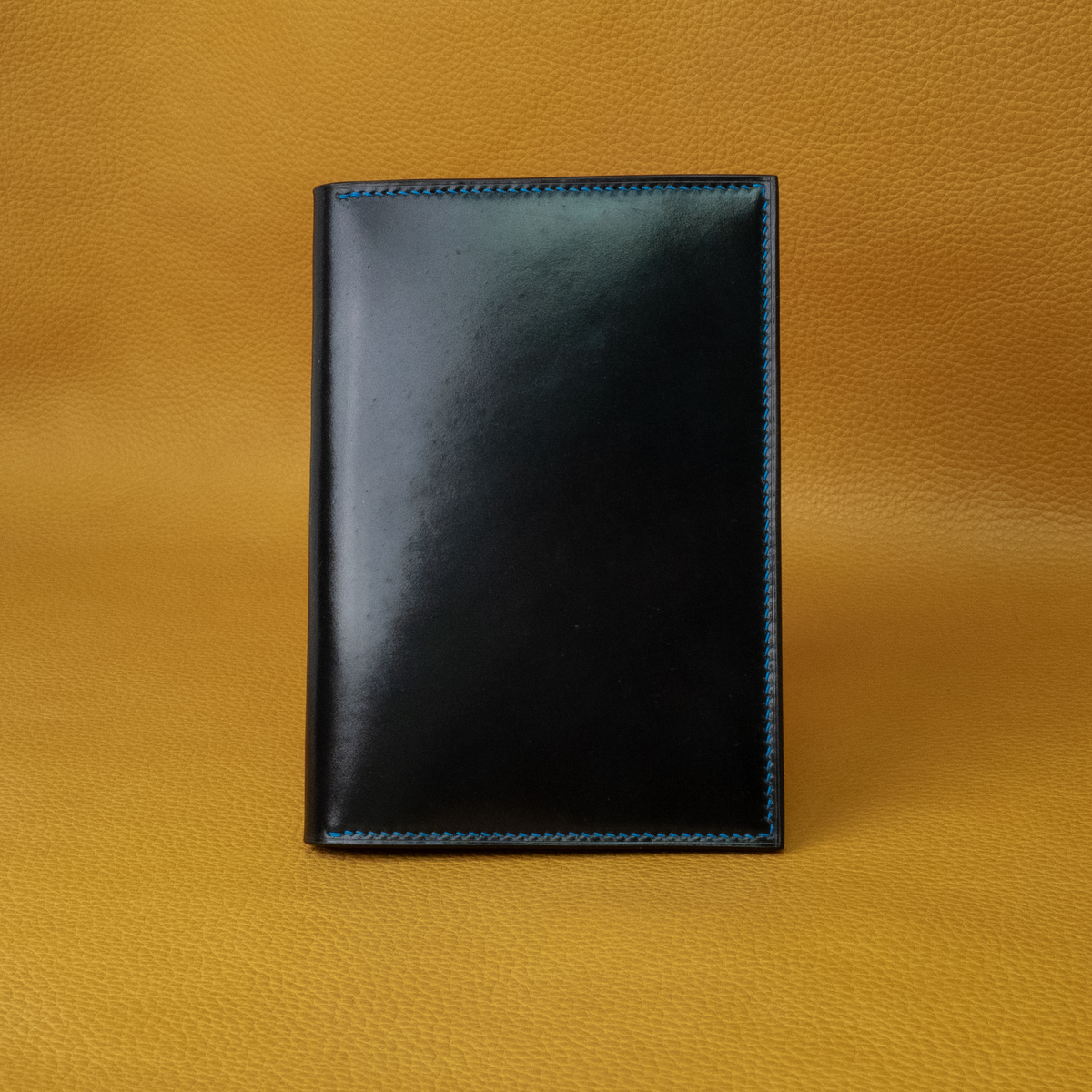 In-Stock: #120 Black Horween Shell Cordovan/Electric Blue French Chévre Passport Cover